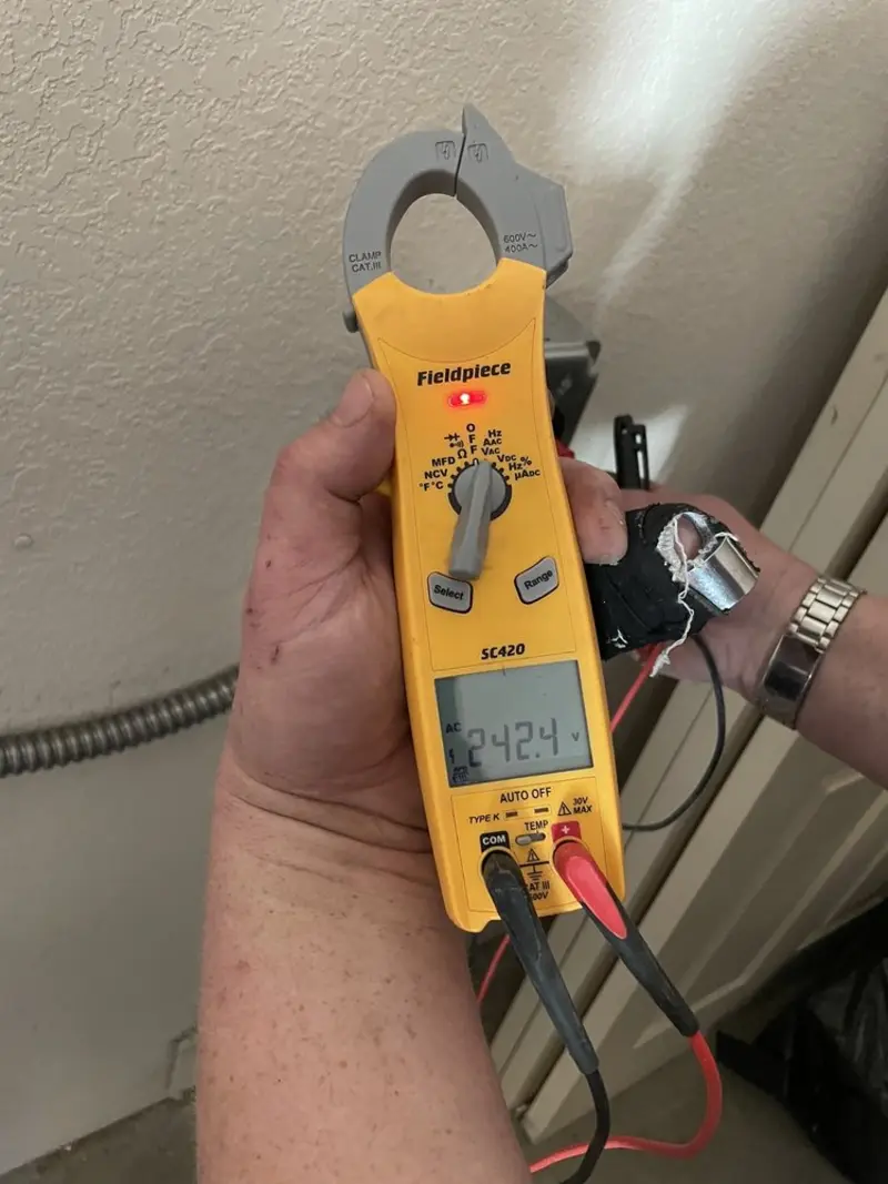 Voltage testing with clamp meter during Recessed Lighting Installation in Fruitland